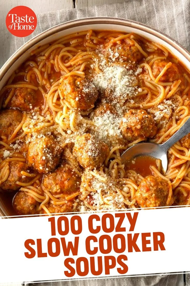 A variety of cozy soups simmering in a slow cooker.