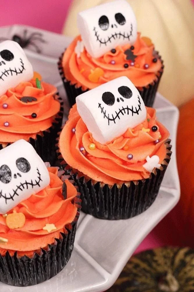 Decorative Halloween cupcakes with spooky themes and fun designs