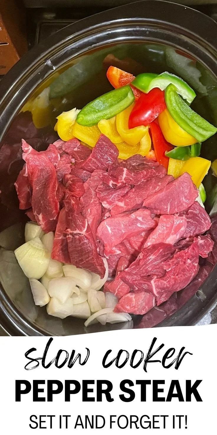 Crock Pot pepper steak served with vegetables in a slow cooker