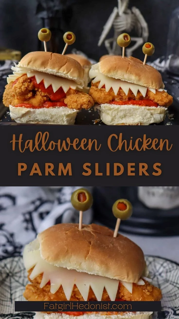 Halloween Chicken Parm Sliders with spooky toppings on a serving platter