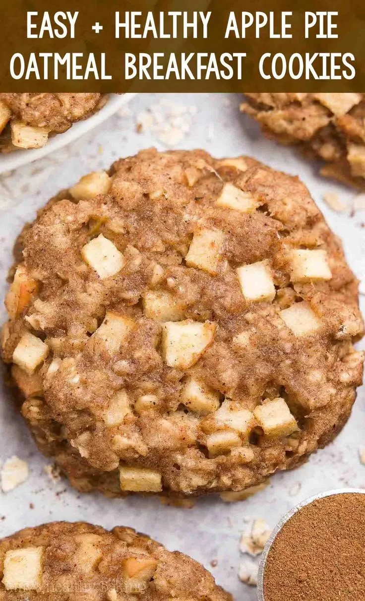 Healthy apple pie oatmeal breakfast cookies stacked on a plate