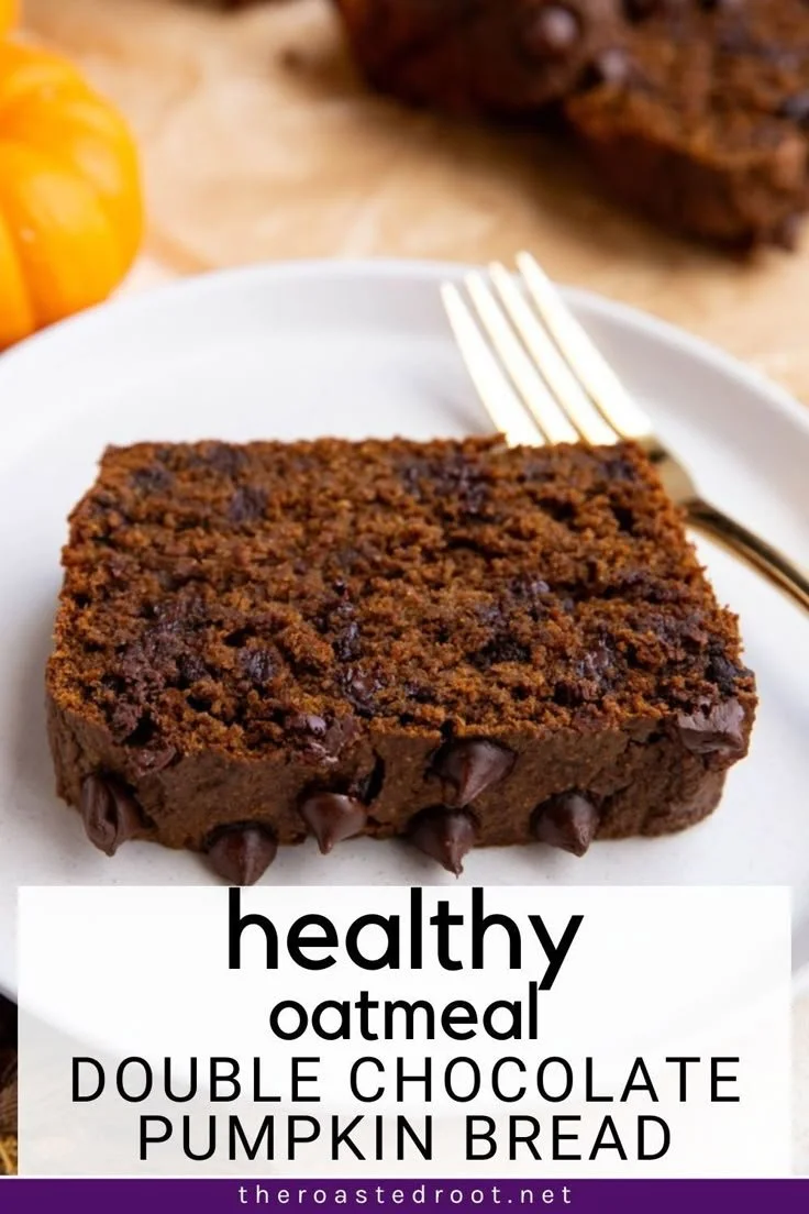 Sliced healthy oatmeal double chocolate pumpkin bread on a wooden table