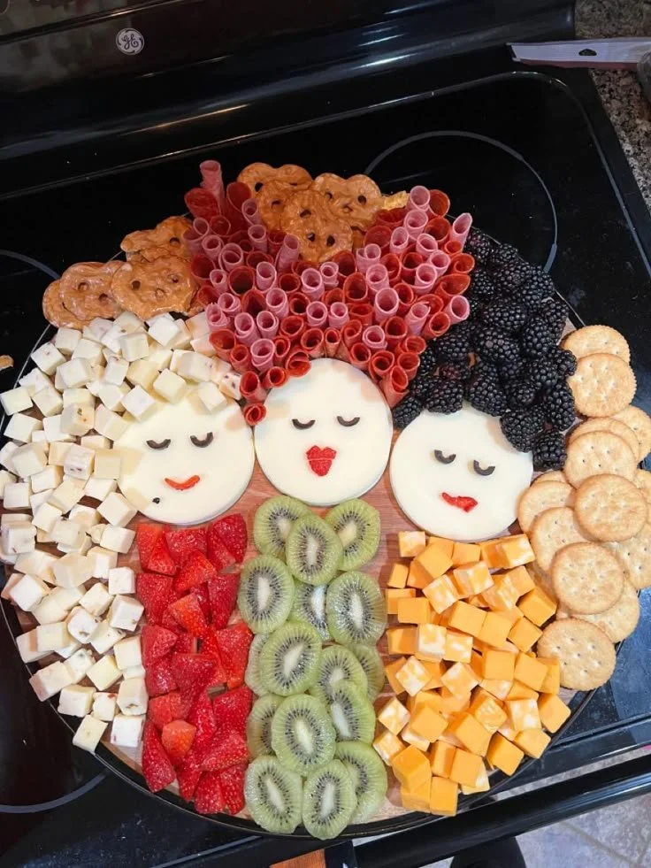 Hocus Pocus themed charcuterie board featuring festive snacks and treats.