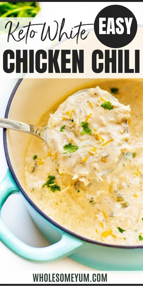 Bowl of Keto White Chicken Chili garnished with cilantro and lime wedges