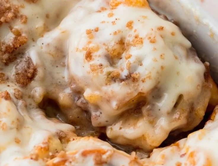 Delicious Peach Cobbler Cinnamon Rolls with fresh peaches and cinnamon glaze