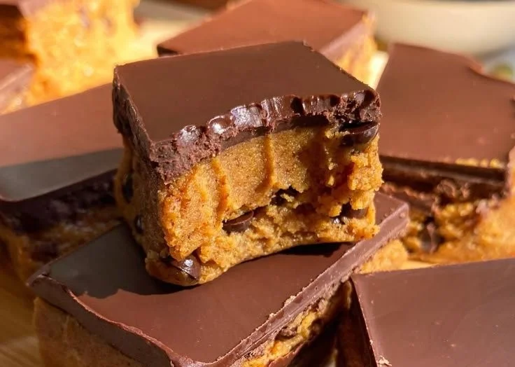 No bake vegan pumpkin protein bars on a plate