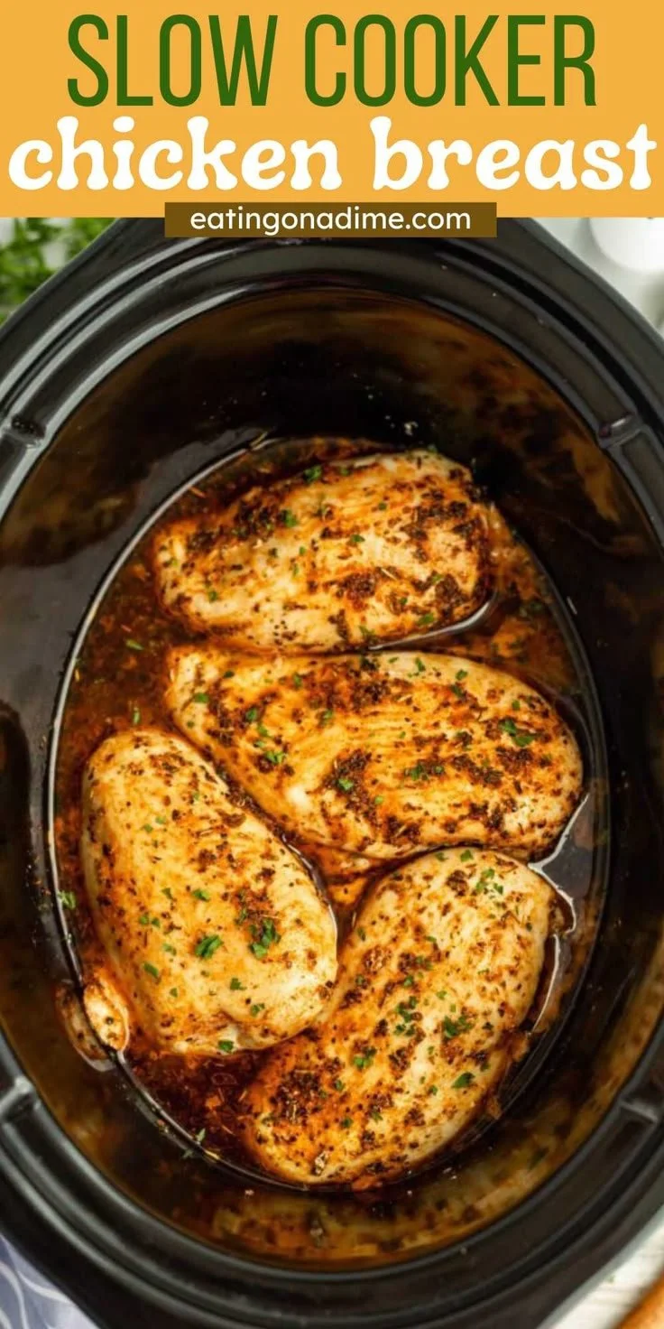 Slow cooker chicken breasts served with vegetables on a plate