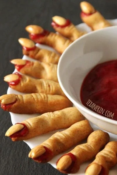 Stranger Wings Halloween snack featuring red icing witch fingers, carrot fingers, and breadstick fingers.